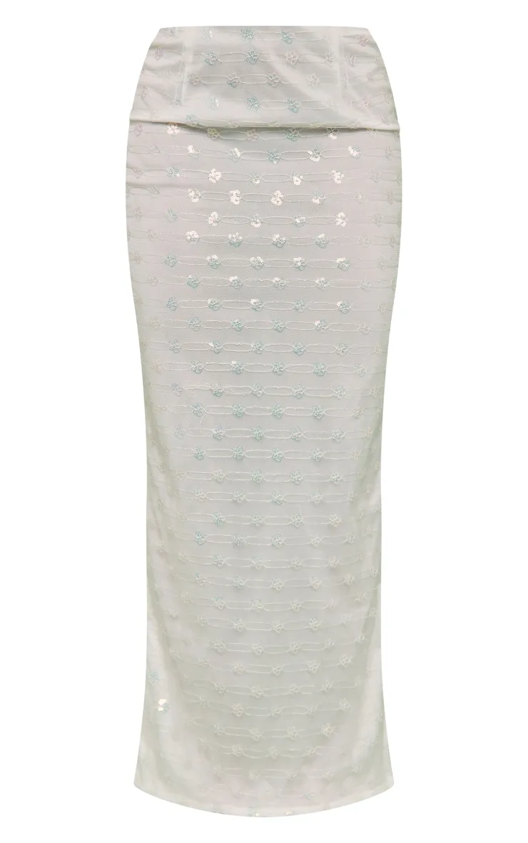 Jupe longue blanche fendue derrière à ornements et sequins