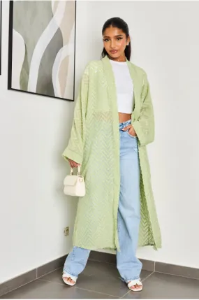 Kimono vert clair ouvert à motif géométrique à fourrure